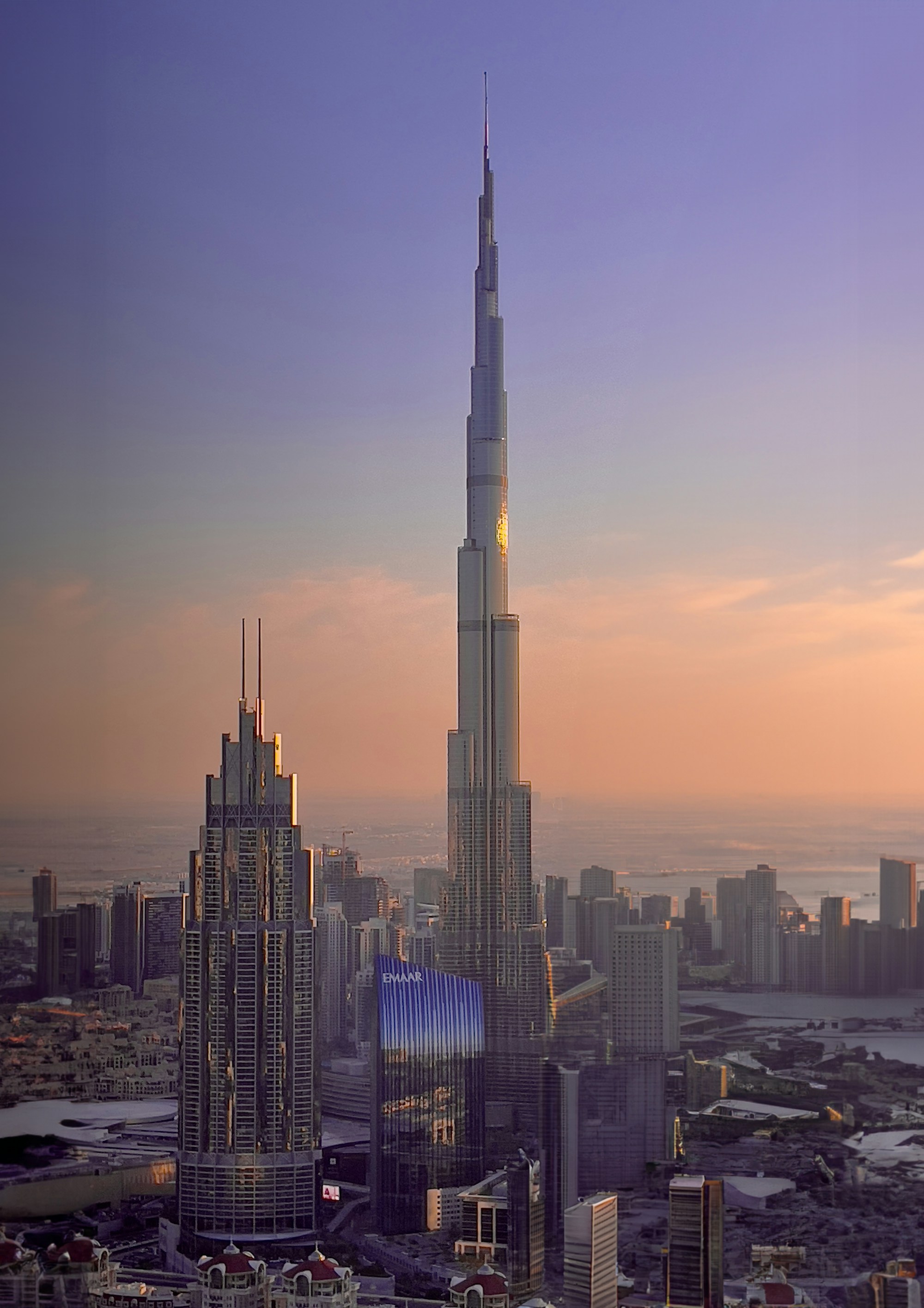 Dubai skyline illuminated at dusk
